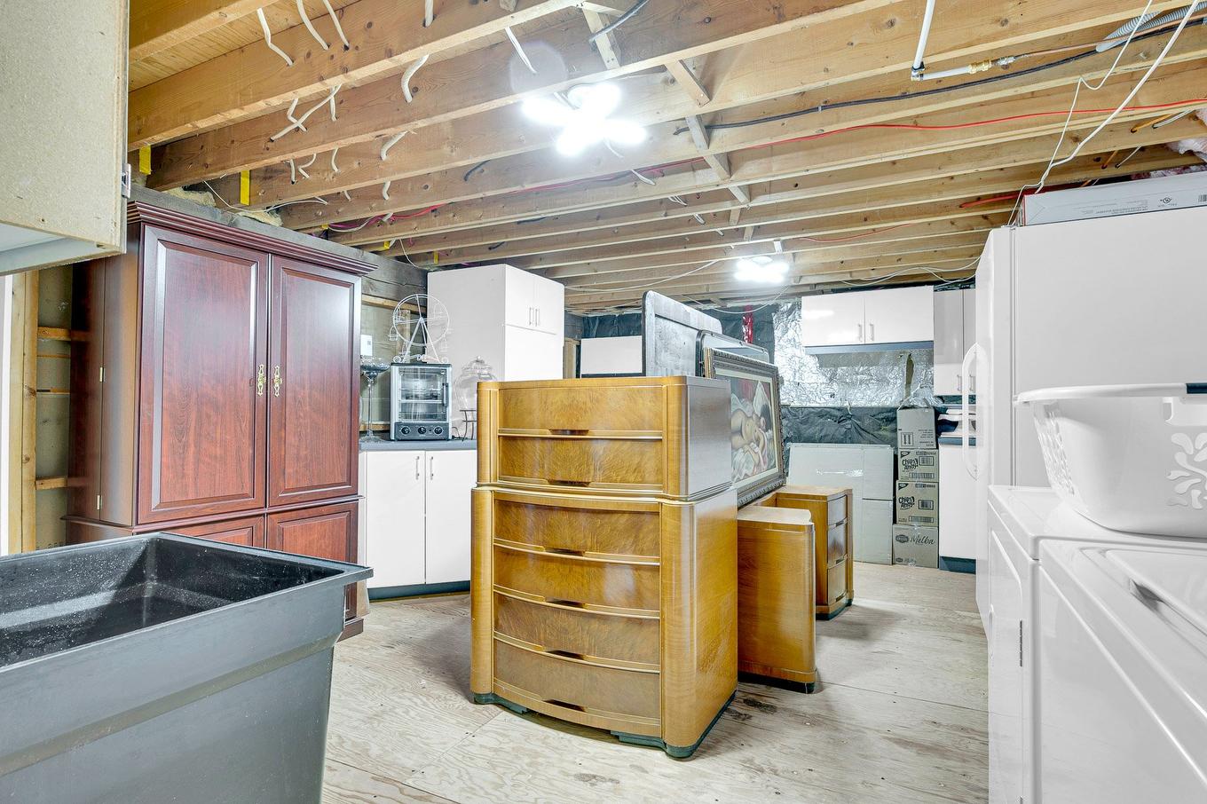 Salle de lavage - 938 Rue Du Relais, Saint-Jérôme, QC - Indoor Photo Showing Basement