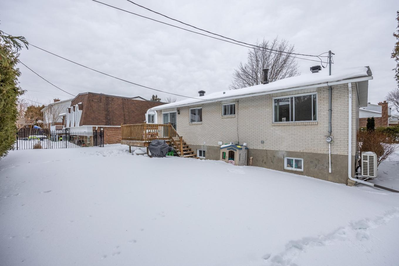 Back facade - 38 Rue De Tarragone, Kirkland, QC - Outdoor With Exterior
