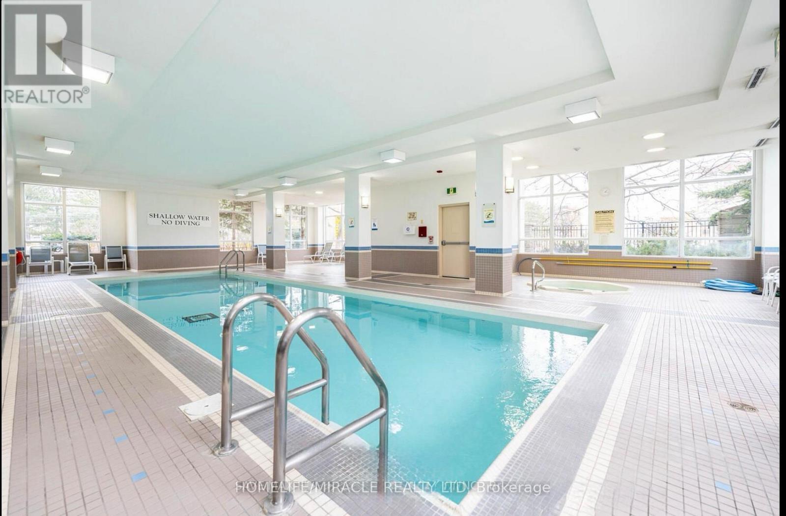 1702 - 3504 Hurontario Street, Mississauga, ON - Indoor Photo Showing Other Room With In Ground Pool