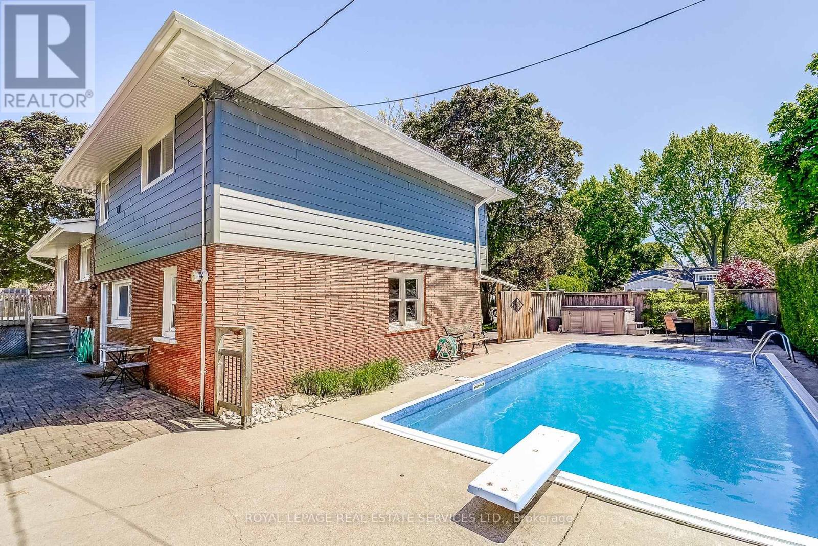 In-ground pool - 351 Strathcona Drive, Burlington, ON - Outdoor With In Ground Pool With Deck Patio Veranda