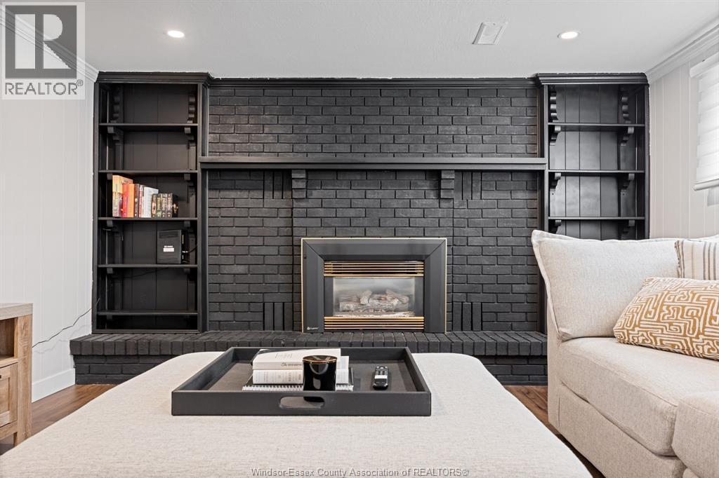 945 Laurier, Lasalle, ON - Indoor Photo Showing Living Room With Fireplace