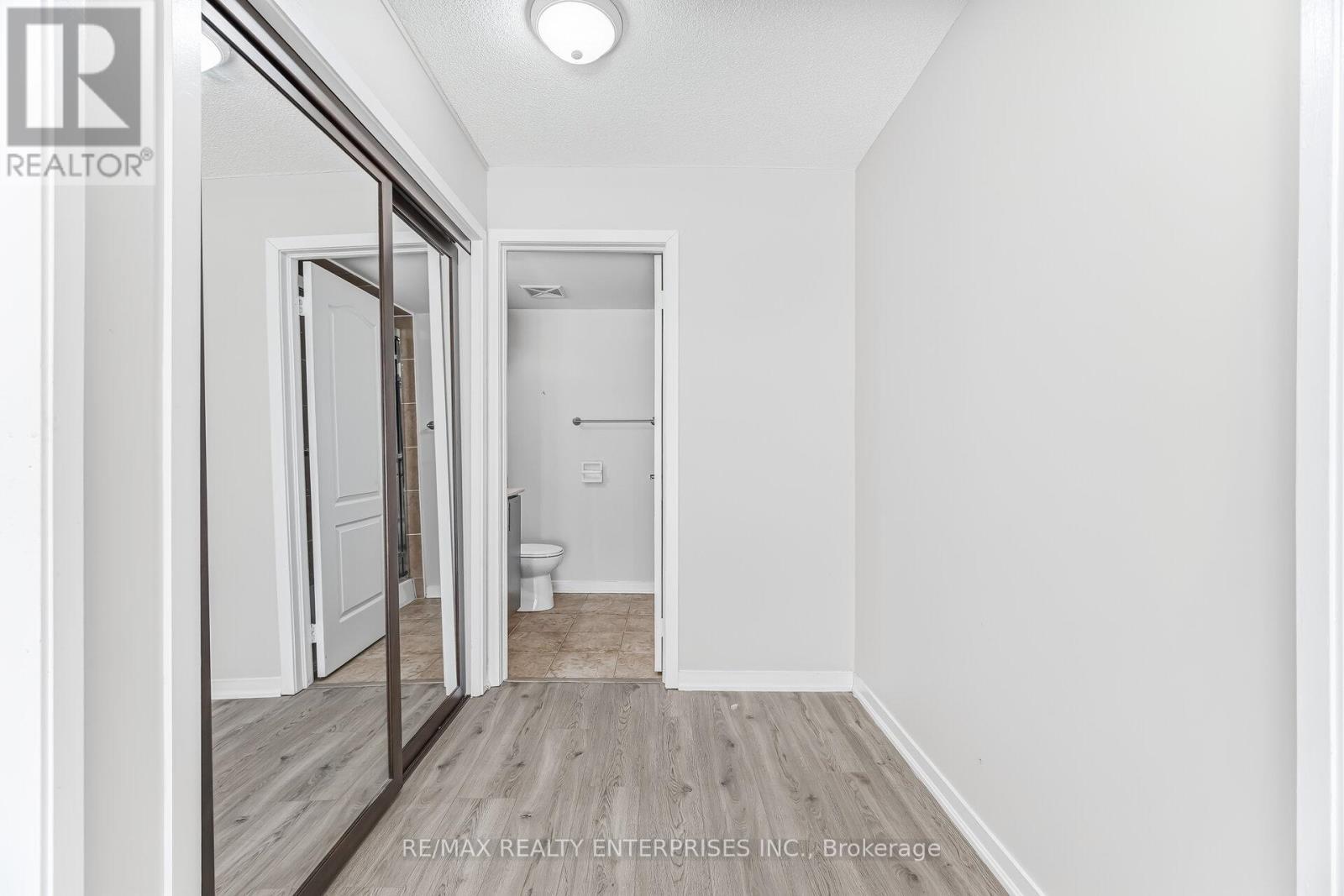 Large Closet and Space for Dresser - 1420 - 8 Dayspring Circle, Brampton, ON - Indoor Photo Showing Other Room