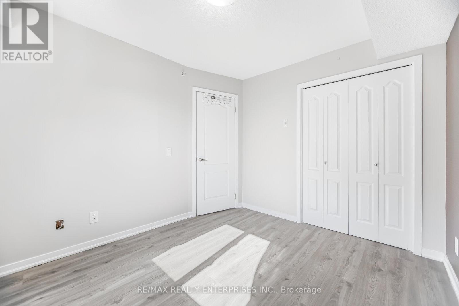 Second Bedroom includes a large closet - 1420 - 8 Dayspring Circle, Brampton, ON - Indoor Photo Showing Other Room