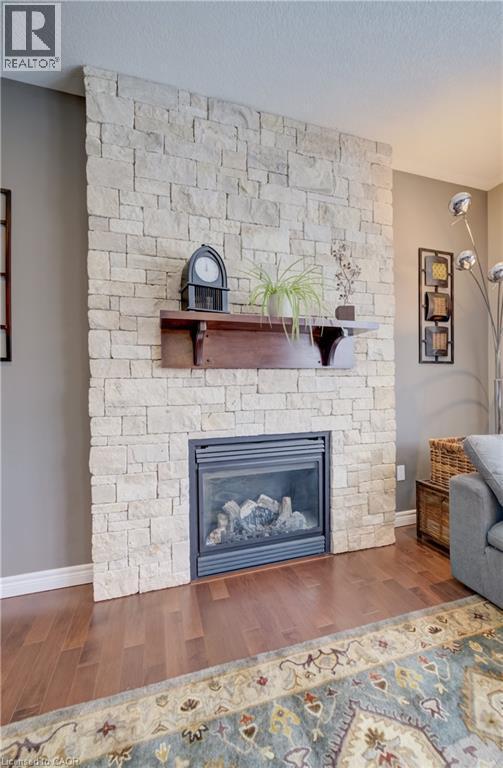 928 Evens Pond Court, Kitchener, ON - Indoor Photo Showing Living Room With Fireplace