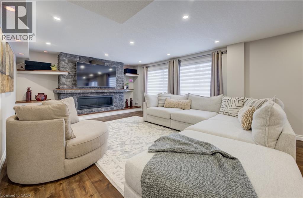 928 Evens Pond Court, Kitchener, ON - Indoor Photo Showing Living Room With Fireplace