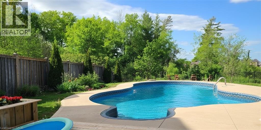 928 Evens Pond Court, Kitchener, ON - Outdoor With In Ground Pool With Deck Patio Veranda With Backyard