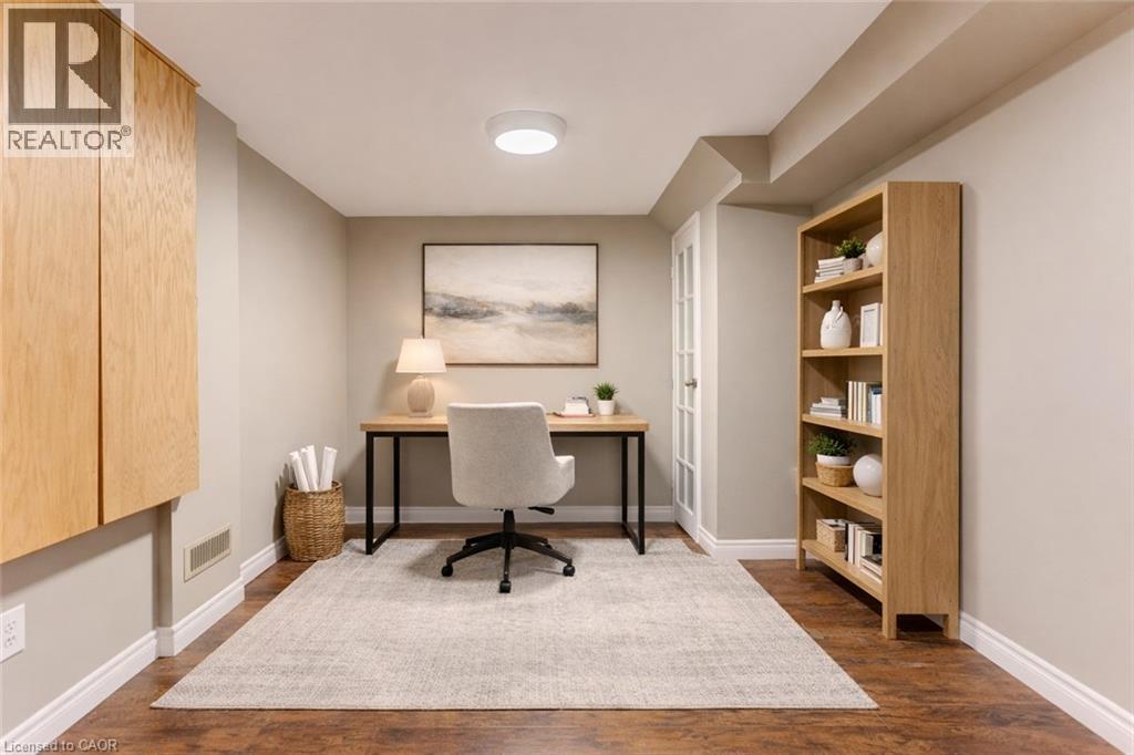 virtually staged with a closet - 404 Wake Robin Crescent, Kitchener, ON - Indoor Photo Showing Office