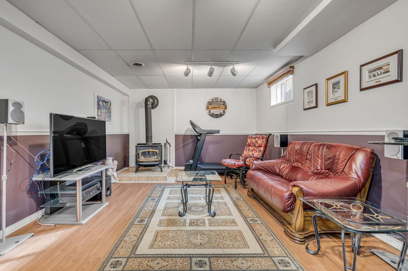 Family room - 2018 Rue Arnaud, Québec (Beauport), QC - Indoor Photo Showing Living Room With Fireplace