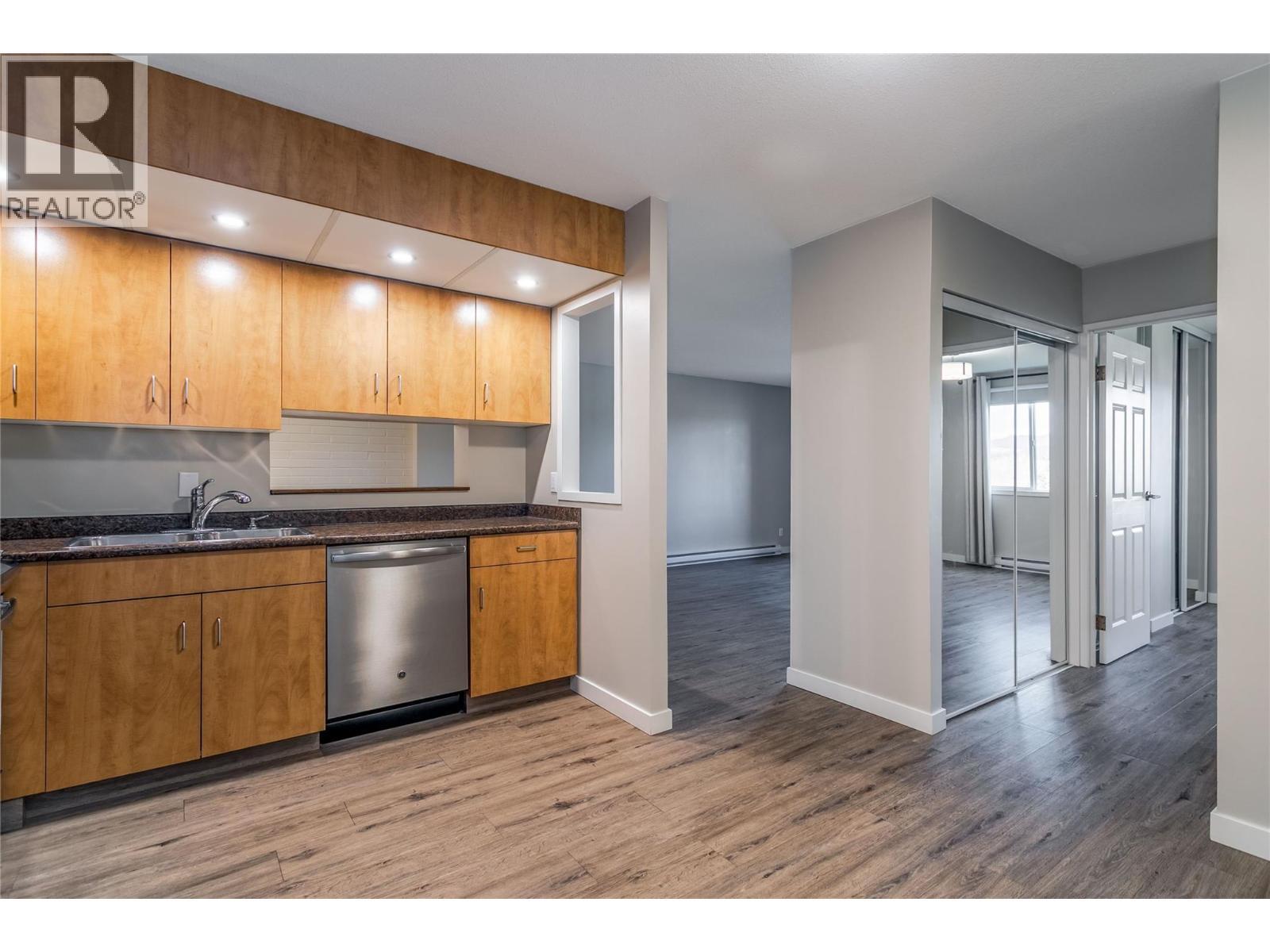 1915 Pacific Court Unit# 407, Kelowna, BC - Indoor Photo Showing Kitchen With Double Sink