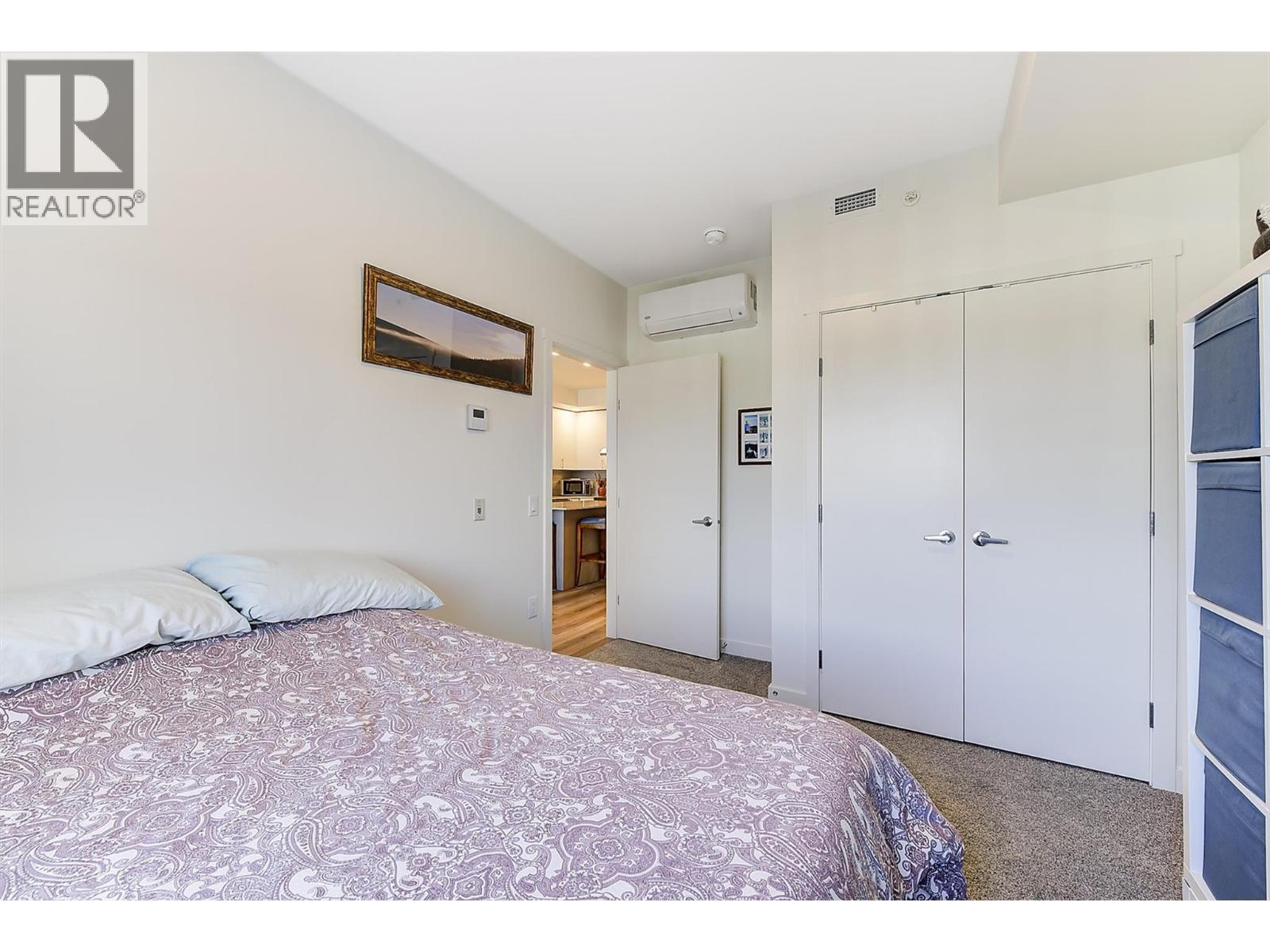 1111 Frost Road Unit# 407, Kelowna, BC - Indoor Photo Showing Bedroom