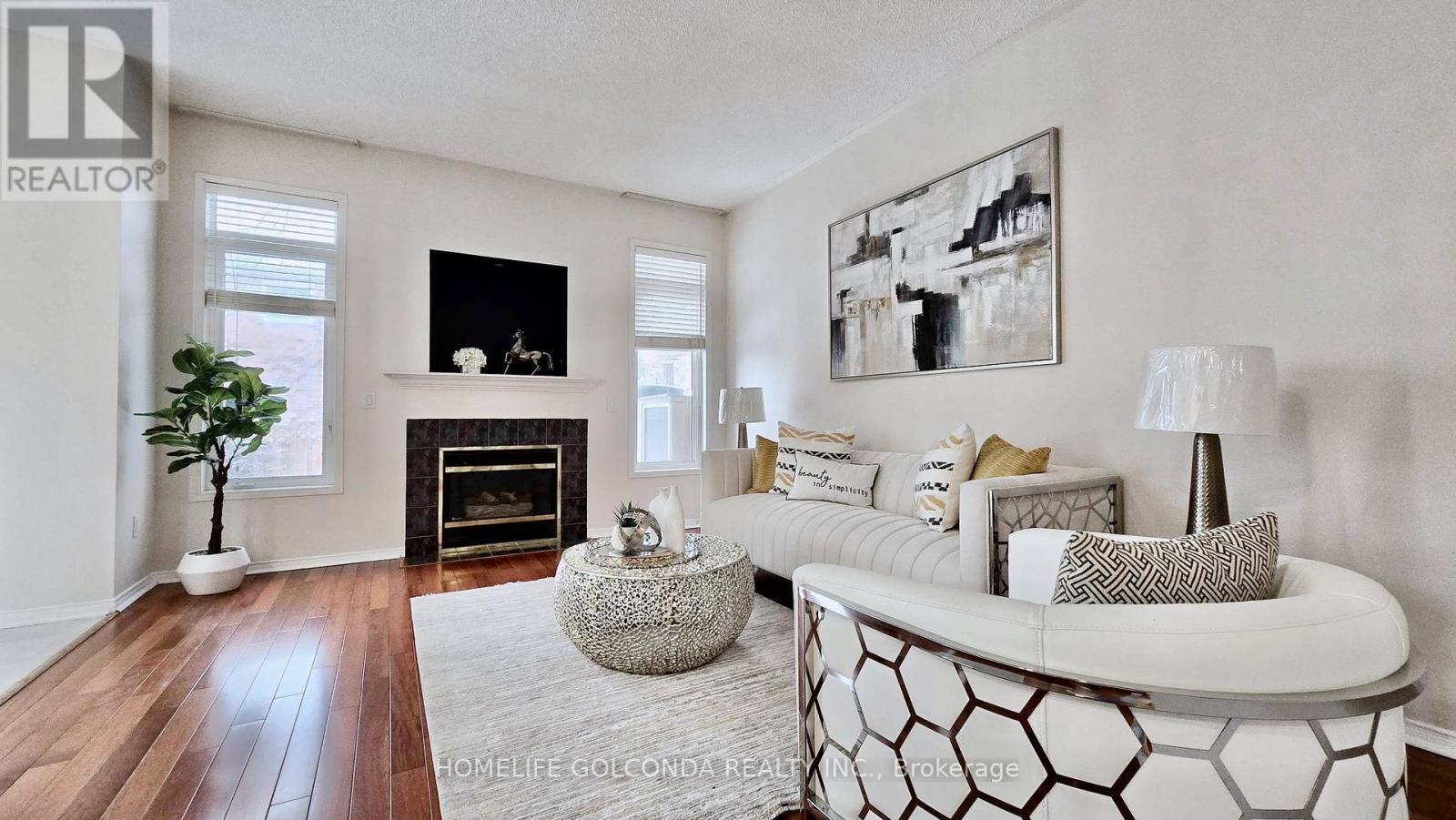 Family - 73 Snowdon Circle, Markham, ON - Indoor Photo Showing Living Room With Fireplace
