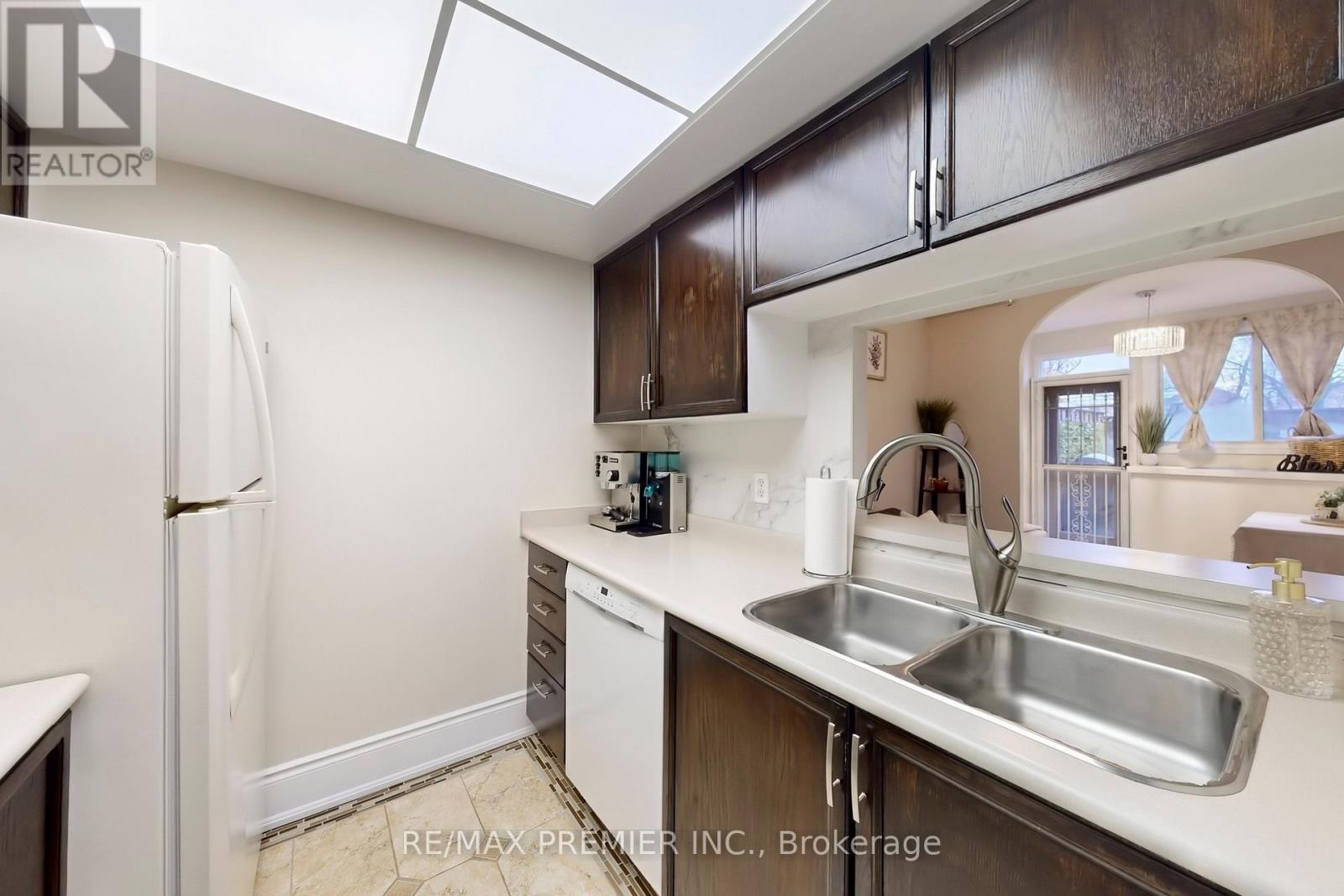 127 - 8351 Mclaughlin Road, Brampton, ON - Indoor Photo Showing Kitchen With Double Sink