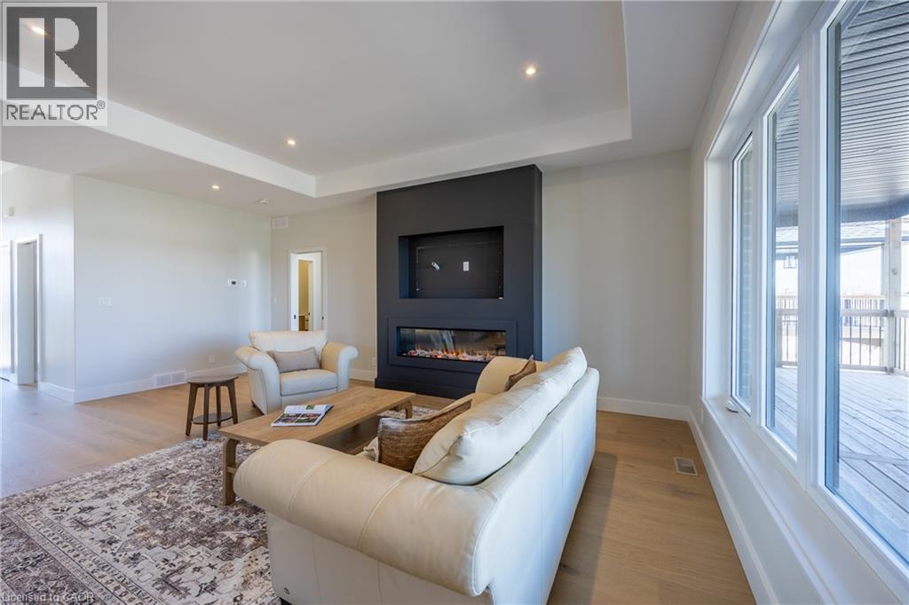 34 Andrew Avenue, Simcoe, ON - Indoor Photo Showing Living Room With Fireplace