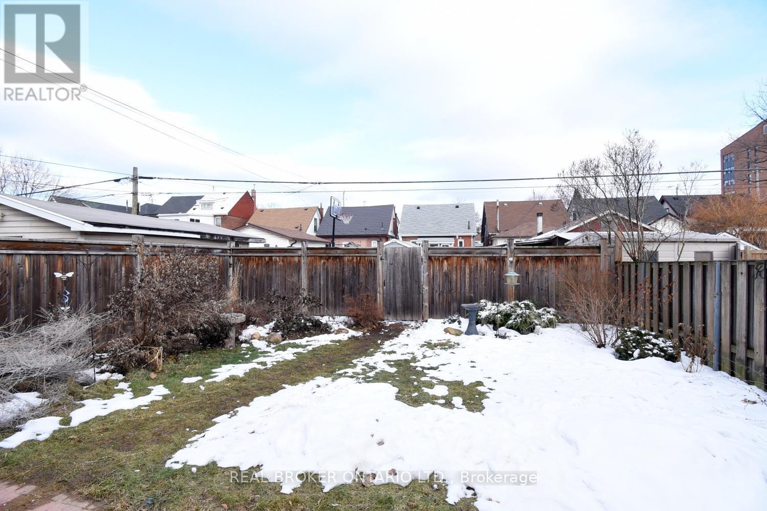 Fenced Backyard w Pollinator Garden - 261 Prospect Street S, Hamilton, ON - Outdoor