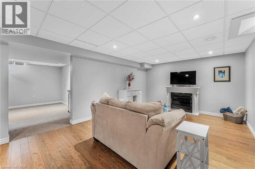 80 Loretta Drive, Virgil, ON - Indoor Photo Showing Living Room With Fireplace