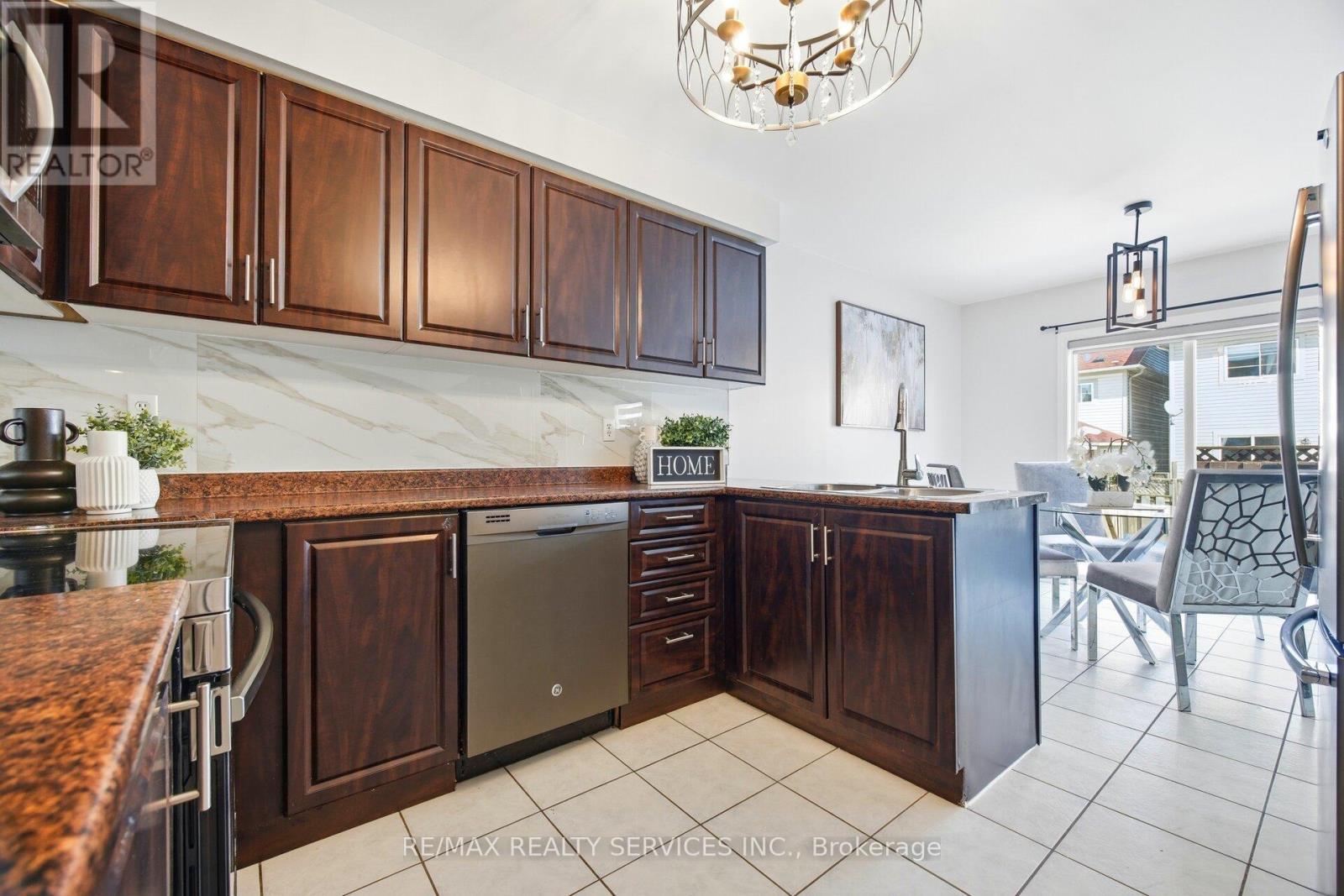 23 Wandering Trail Drive, Brampton, ON - Indoor Photo Showing Kitchen With Double Sink