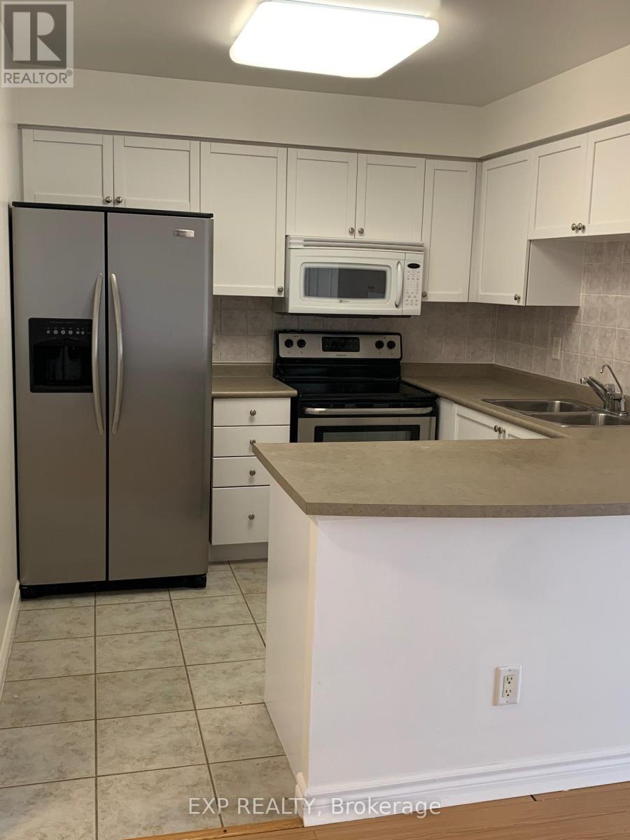 2120 - 25 Kingsbridge Garden Circle, Mississauga, ON - Indoor Photo Showing Kitchen With Double Sink