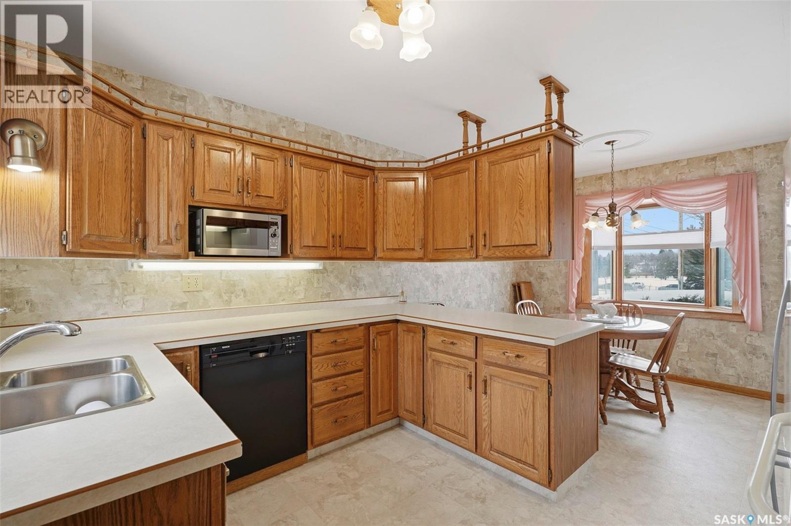 3 Valens Drive, Saskatoon, SK - Indoor Photo Showing Kitchen With Double Sink