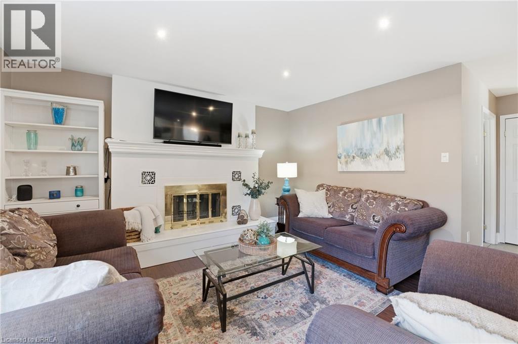 23 Vance Crescent, Waterdown, ON - Indoor Photo Showing Living Room With Fireplace
