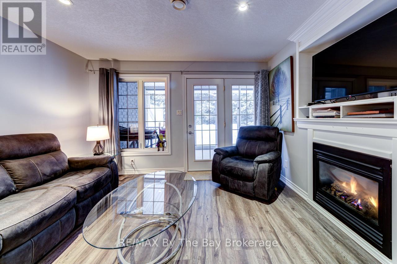 65 Meadow Lane, Wasaga Beach, ON - Indoor Photo Showing Living Room With Fireplace
