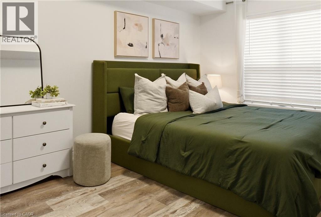 1045 Nadalin Heights Unit# 108, Milton, ON - Indoor Photo Showing Bedroom