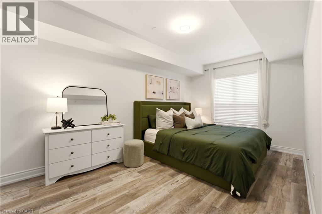 1045 Nadalin Heights Unit# 108, Milton, ON - Indoor Photo Showing Bedroom