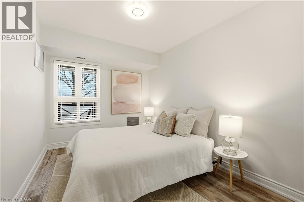 1045 Nadalin Heights Unit# 108, Milton, ON - Indoor Photo Showing Bedroom