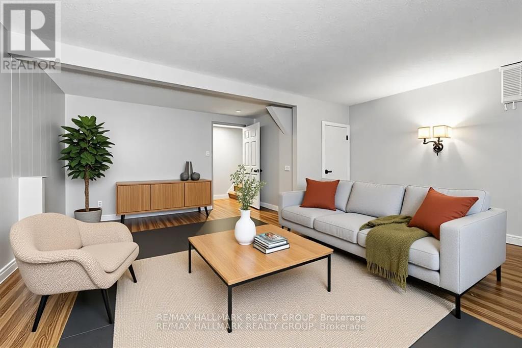 Photo Virtually Staged - 51 - 1803 Lamoureux Drive, Ottawa, ON - Indoor Photo Showing Living Room