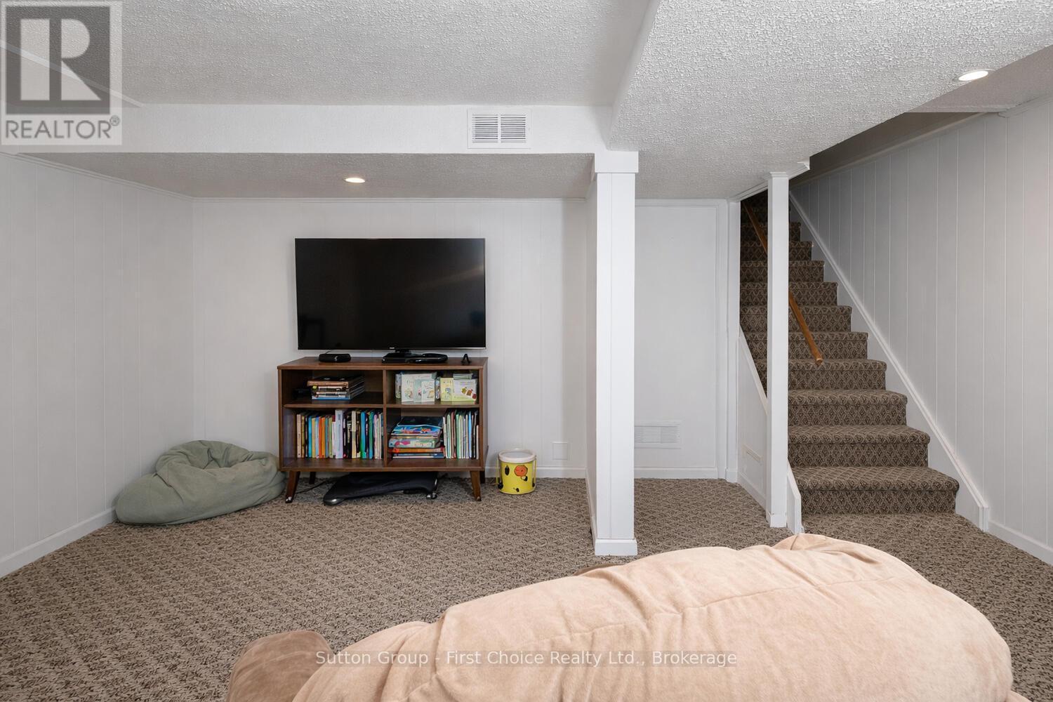 Family Room in Basement - 12 - 91 Avonwood Drive, Stratford, ON - Indoor Photo Showing Other Room