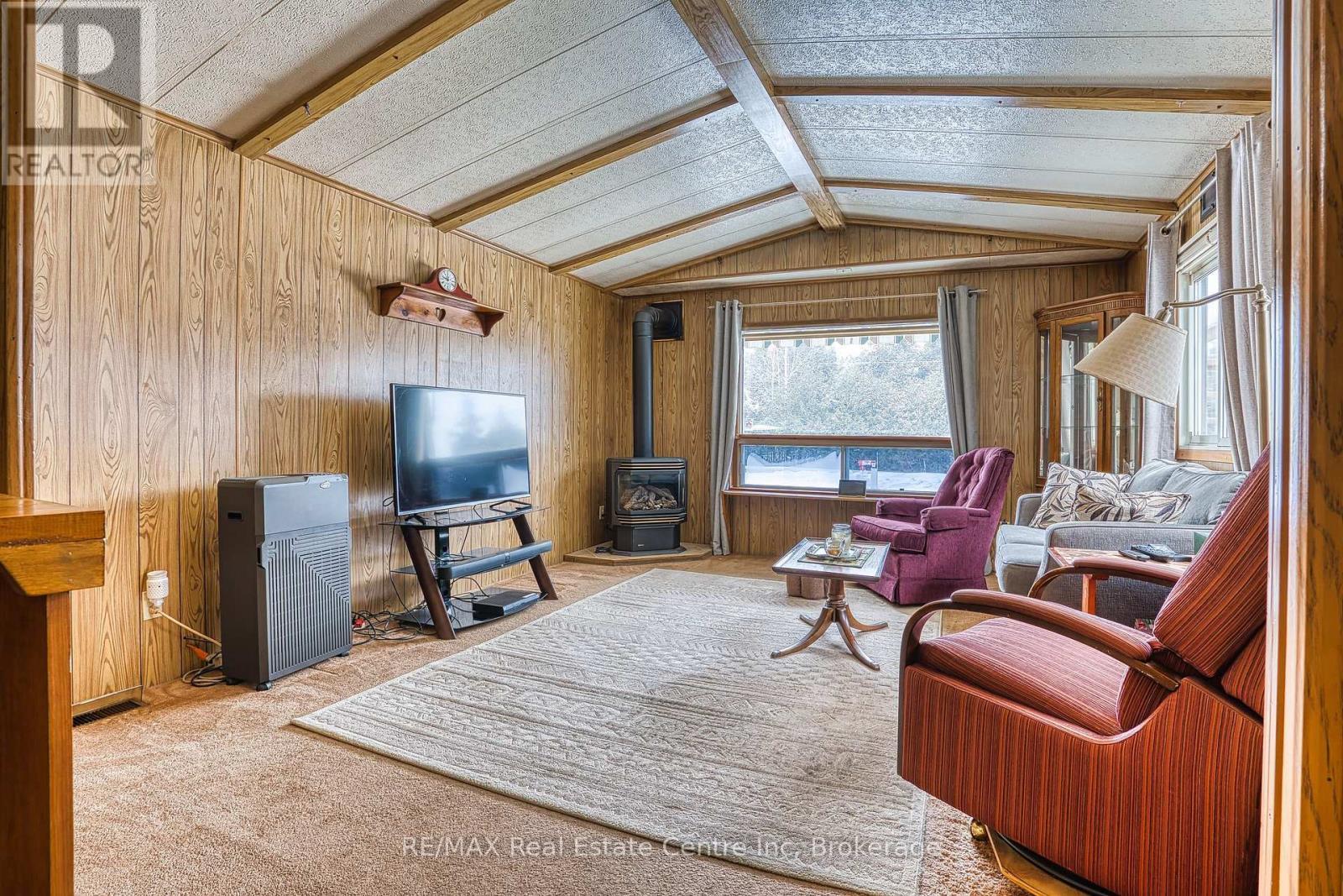 54 First Avenue, Wellington North, ON - Indoor With Fireplace