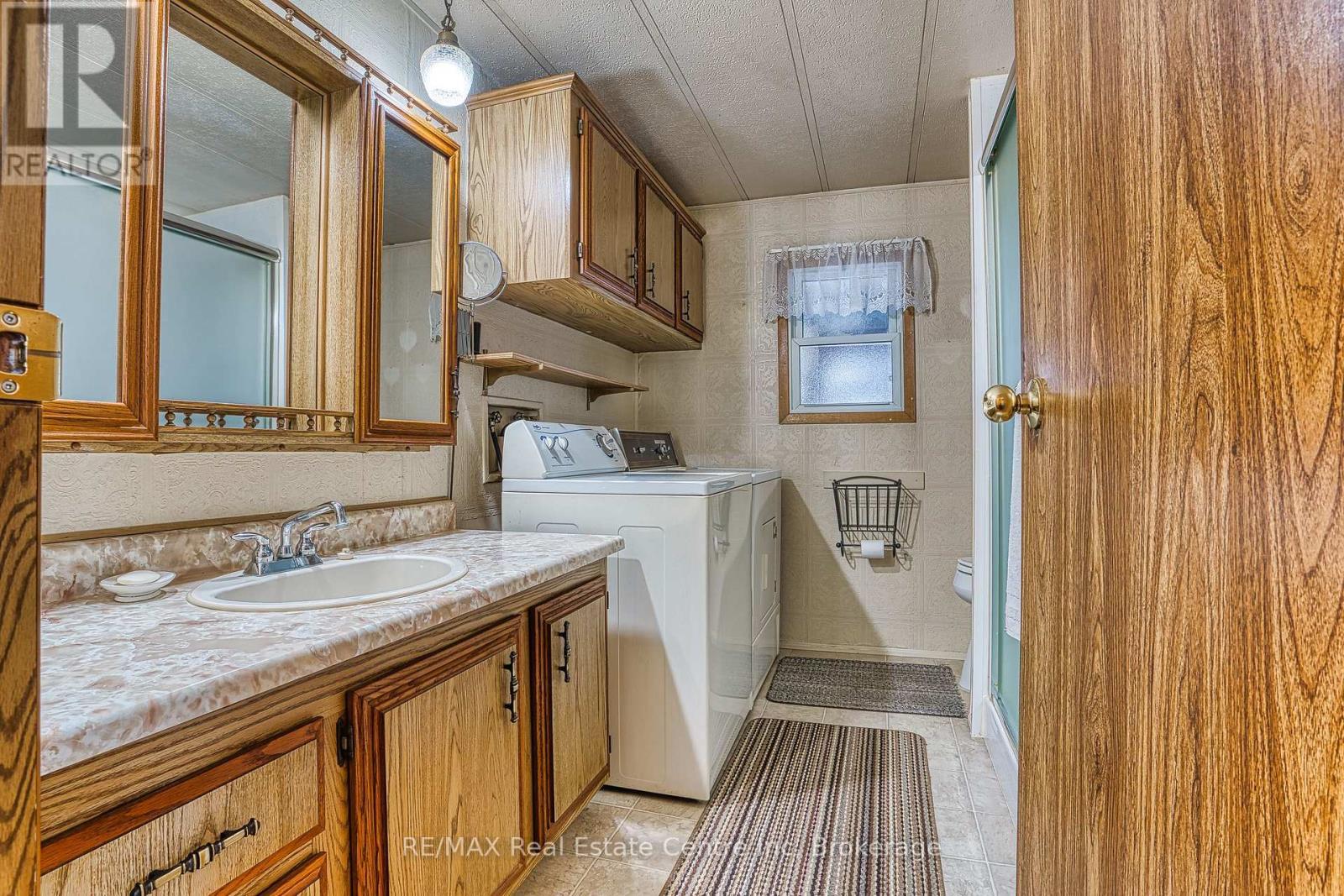 3pc bath with laundry (walk in shower) - 54 First Avenue, Wellington North, ON - Indoor Photo Showing Laundry Room
