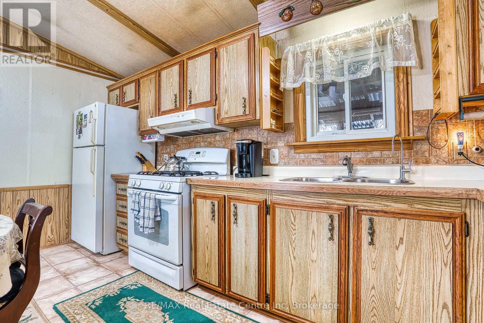54 First Avenue, Wellington North, ON - Indoor Photo Showing Kitchen With Double Sink