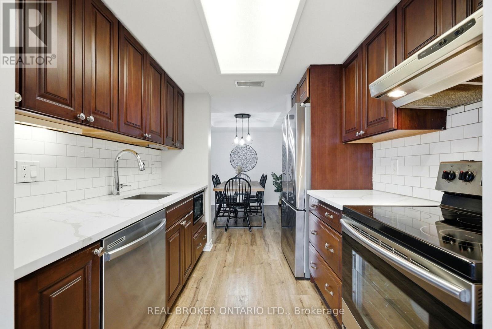 703 - 100 Grant Carman Drive, Ottawa, ON - Indoor Photo Showing Kitchen With Upgraded Kitchen