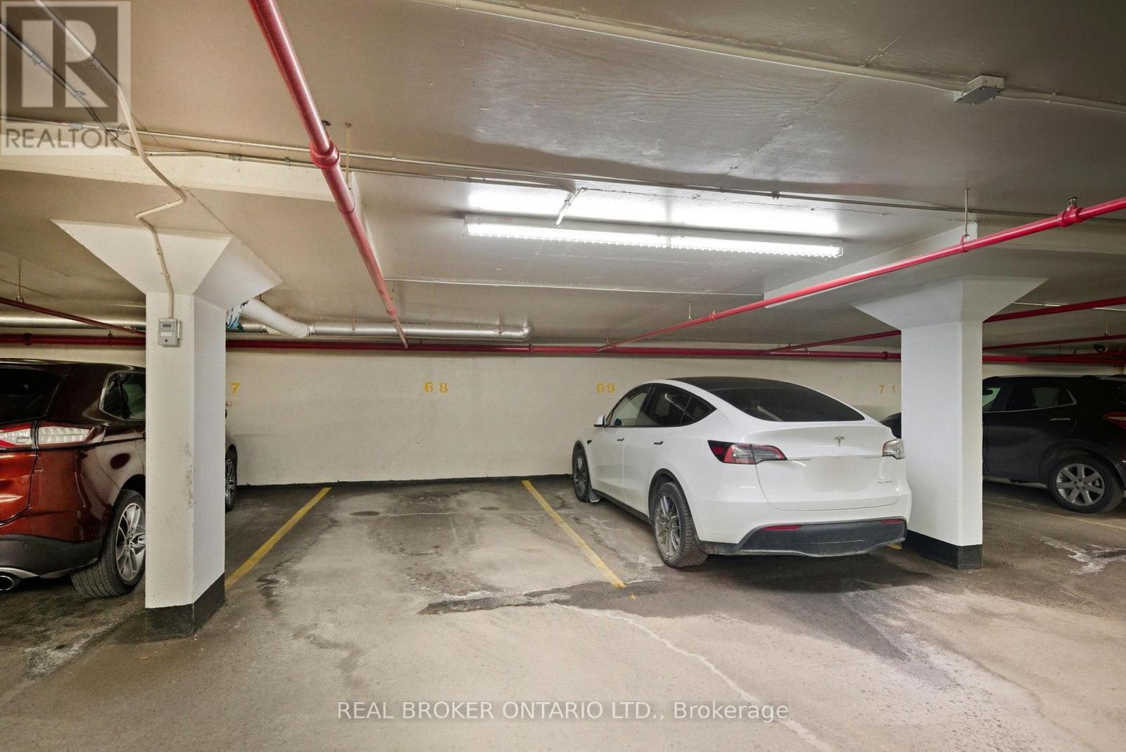 703 - 100 Grant Carman Drive, Ottawa, ON - Indoor Photo Showing Garage