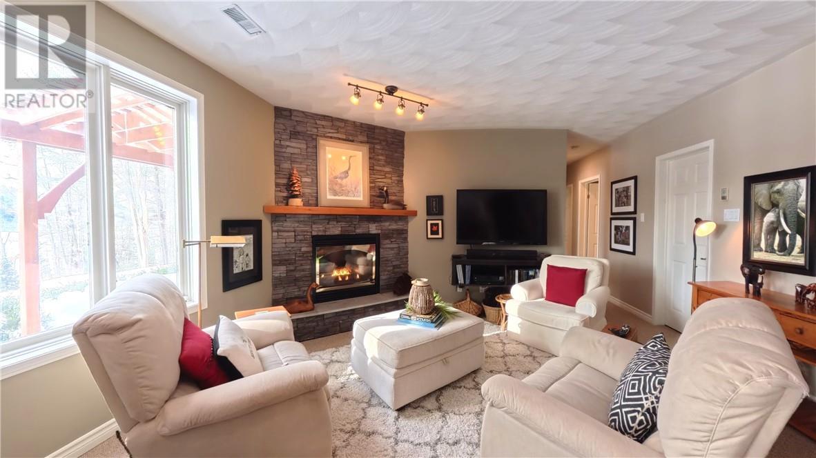 357 Clear Lake, Espanola, ON - Indoor Photo Showing Living Room With Fireplace