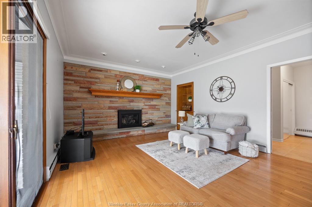 3071 Lauzon Road, Windsor, ON - Indoor Photo Showing Living Room With Fireplace