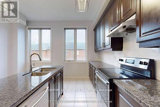 10 Hyderabad Lane, Markham, ON - Indoor Photo Showing Kitchen With Double Sink