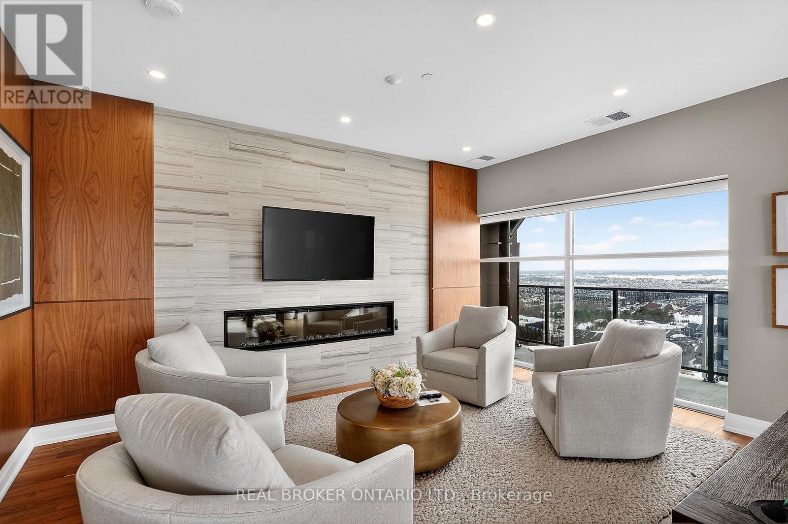 609 - 1878 Gordon Street, Guelph, ON - Indoor Photo Showing Living Room With Fireplace