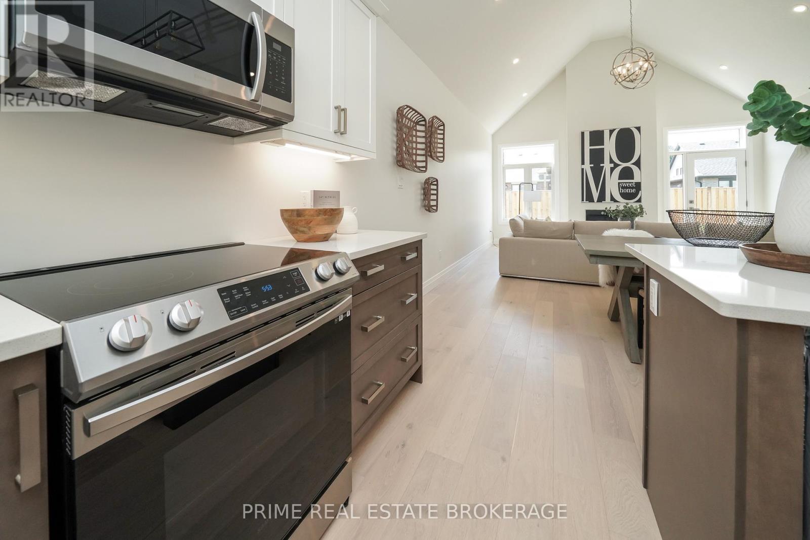 Unit to be built - Photos are of model unit. - 2 - 62 Compass Trail, Central Elgin, ON