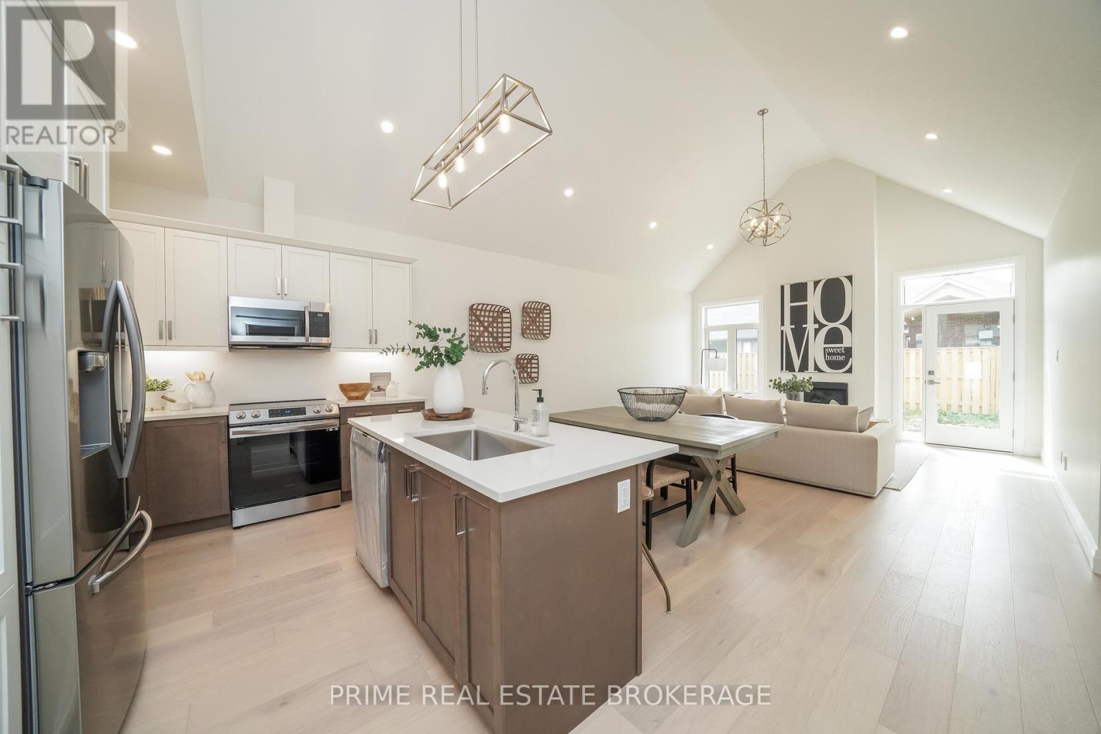 Unit to be built - Photos are of model unit. - 2 - 62 Compass Trail, Central Elgin, ON