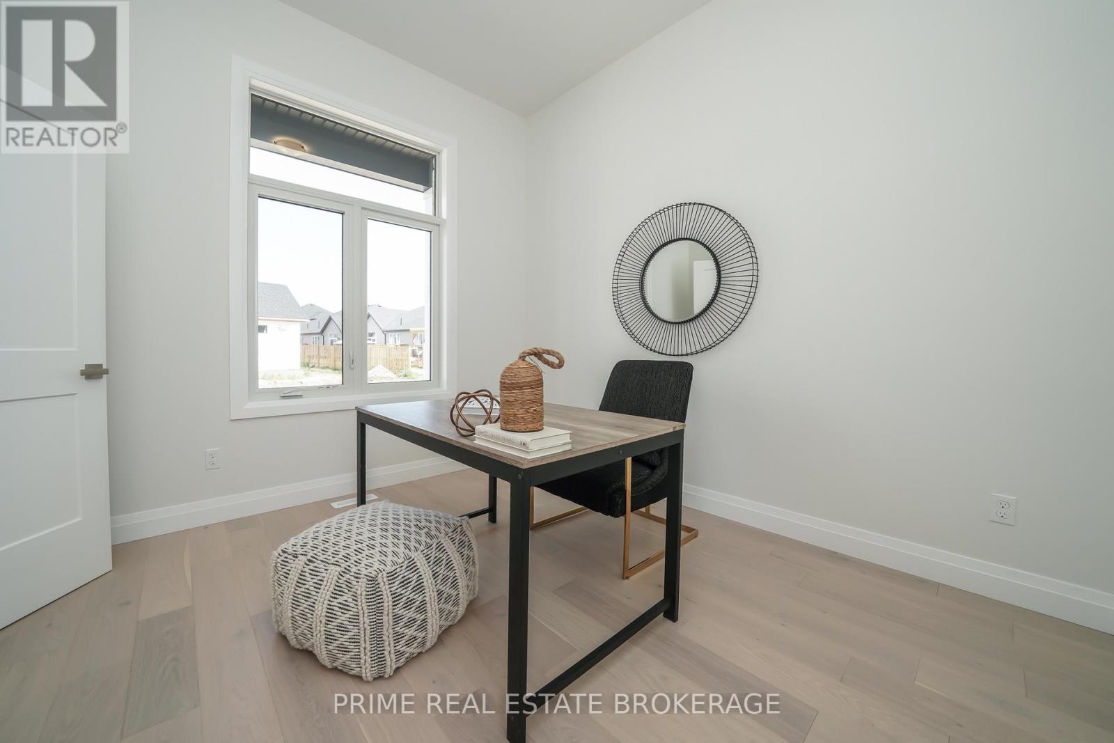 Unit to be built - Photos are of model unit. - 2 - 62 Compass Trail, Central Elgin, ON