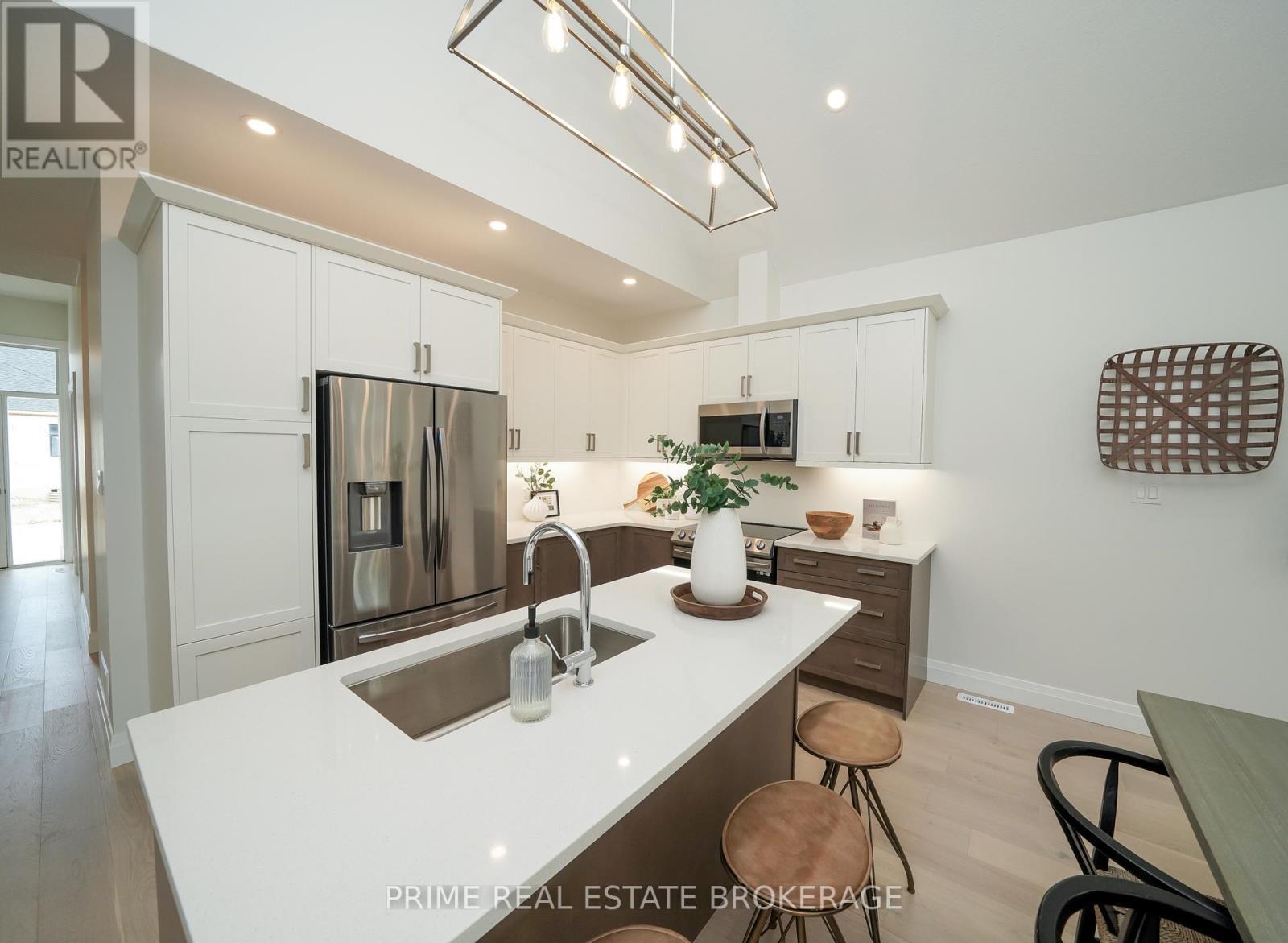 Unit to be built - Photos are of model unit. - 2 - 62 Compass Trail, Central Elgin, ON