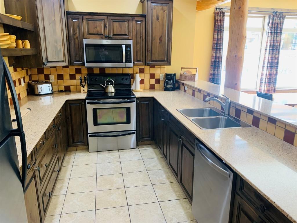 04A-1351 Gerry Sorensen Way, Kimberley, BC - Indoor Photo Showing Kitchen With Double Sink