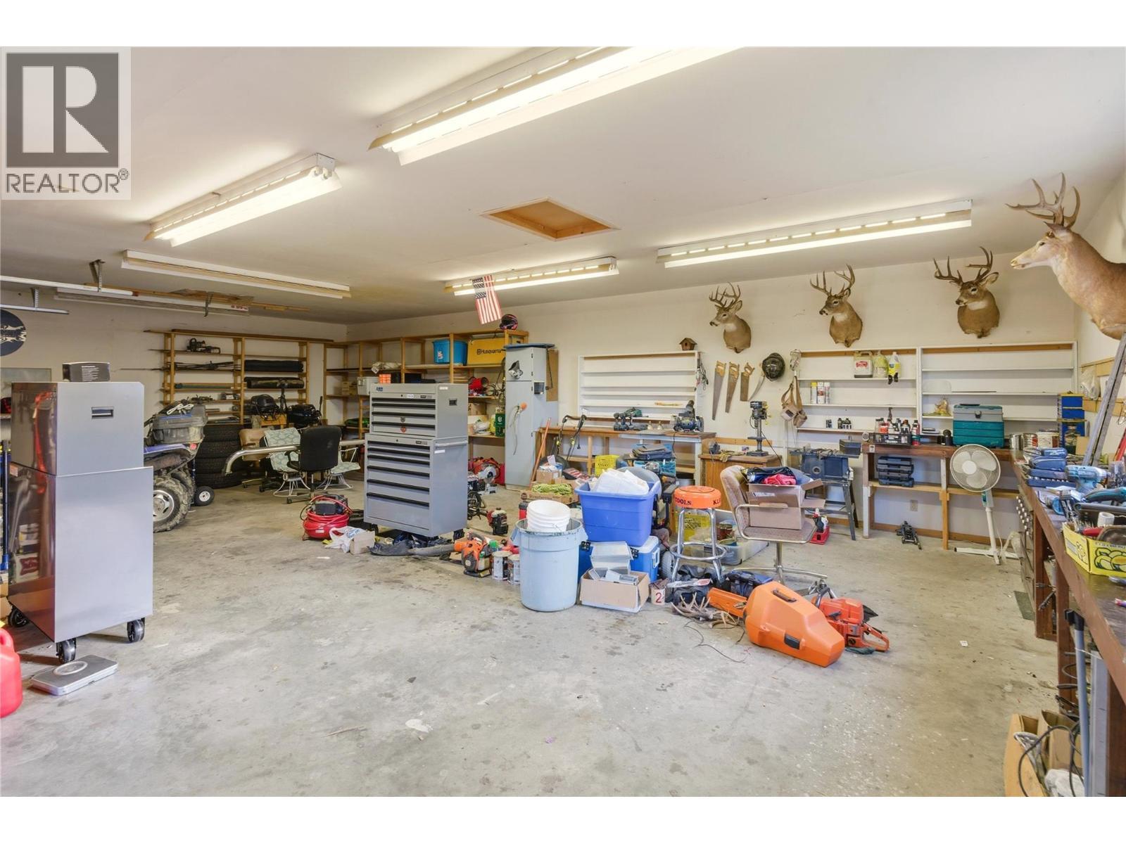 Detached Shop 39' x 26' - 1099 Dehart Road, Kelowna, BC - Indoor Photo Showing Garage