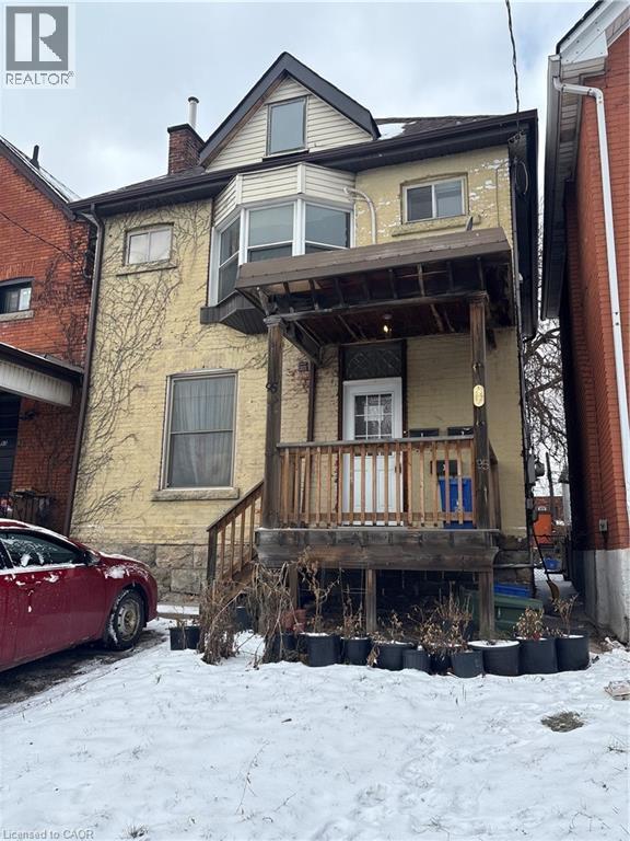 View of front of home with a chimney - 95 Sanford Avenue N, Hamilton, ON - Outdoor