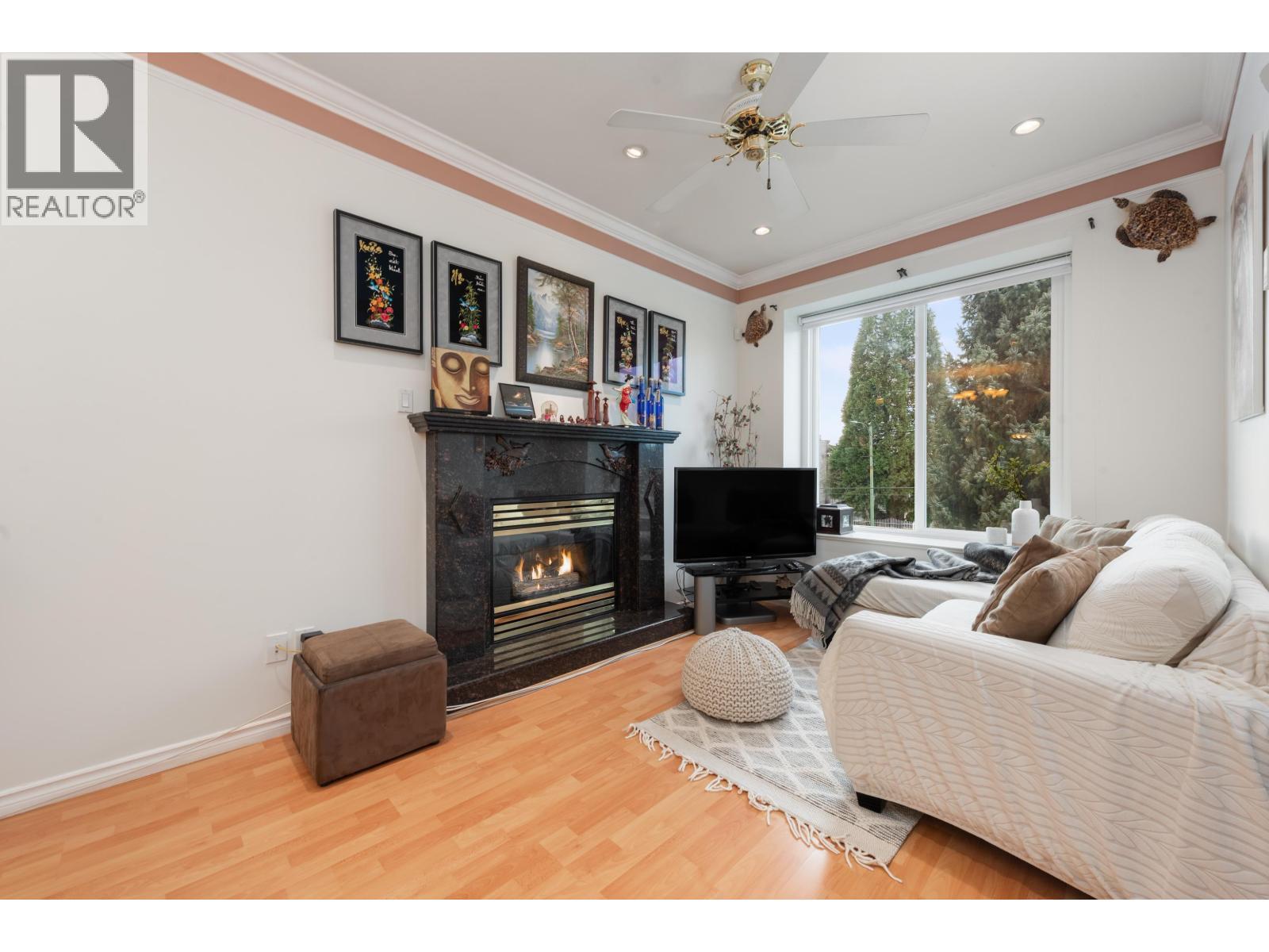 2423 E 4Th Avenue, Vancouver, BC - Indoor Photo Showing Living Room With Fireplace