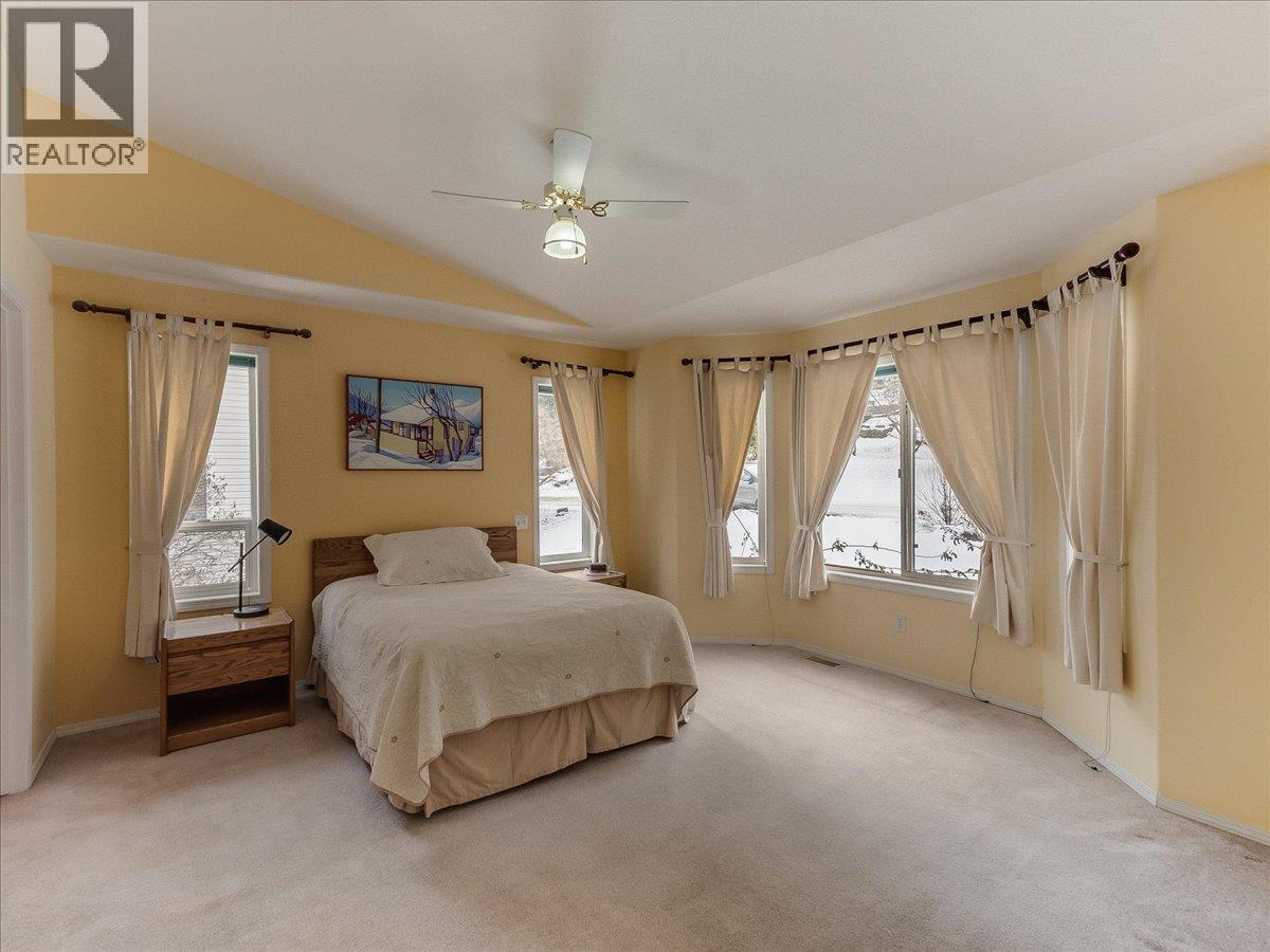Primary Bedroom - 702 Munro Street, Nelson, BC - Indoor Photo Showing Bedroom