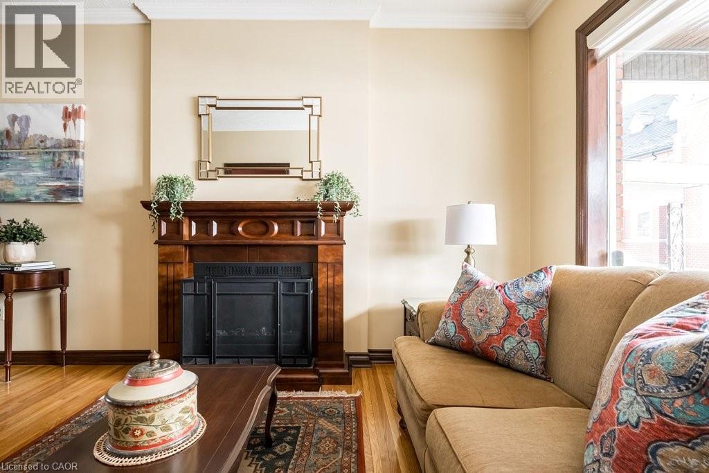 167 Park Street N, Hamilton, ON - Indoor Photo Showing Living Room With Fireplace