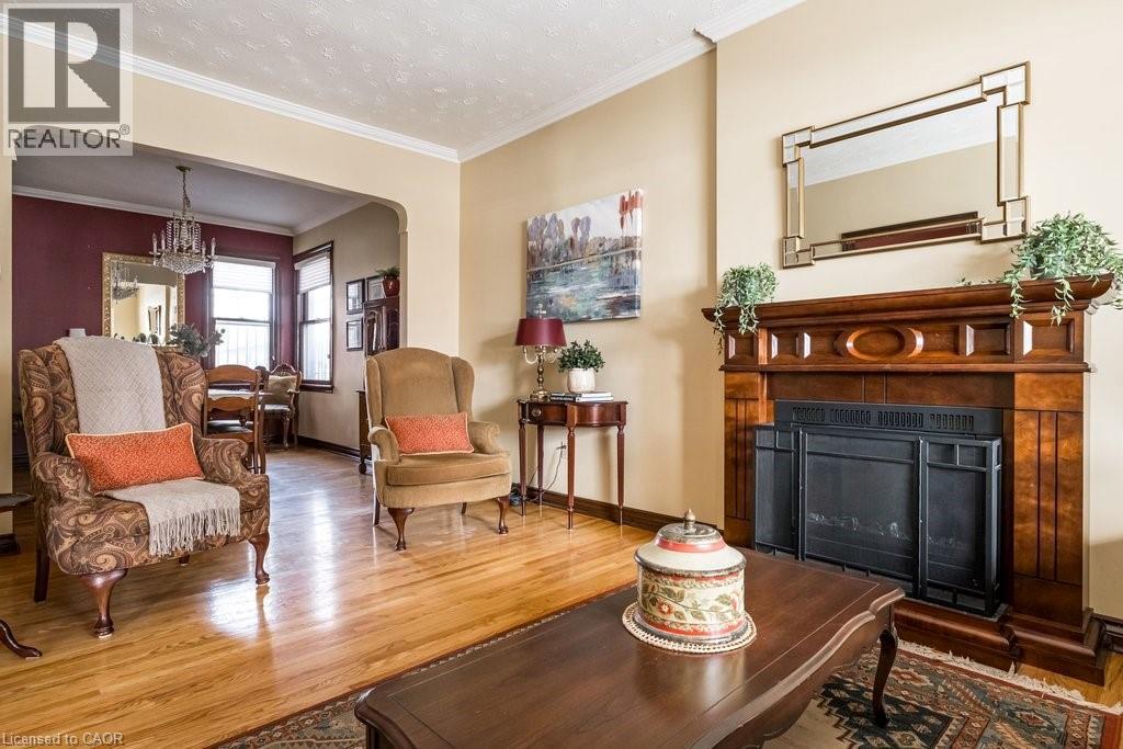 167 Park Street N, Hamilton, ON - Indoor Photo Showing Living Room With Fireplace