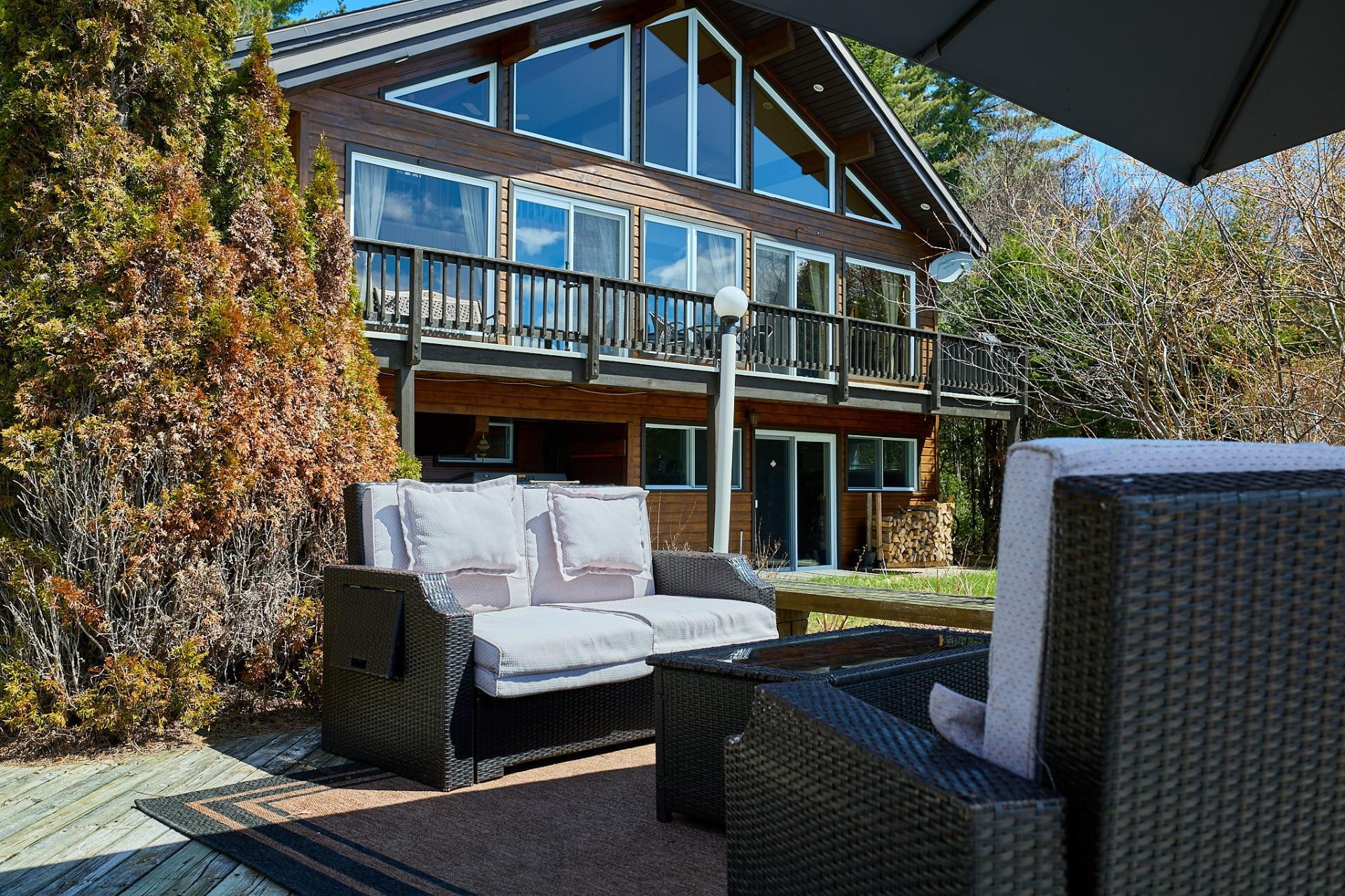 Front of Structure - 670 Ch. Des Îles, Entrelacs, QC - Outdoor With Deck Patio Veranda